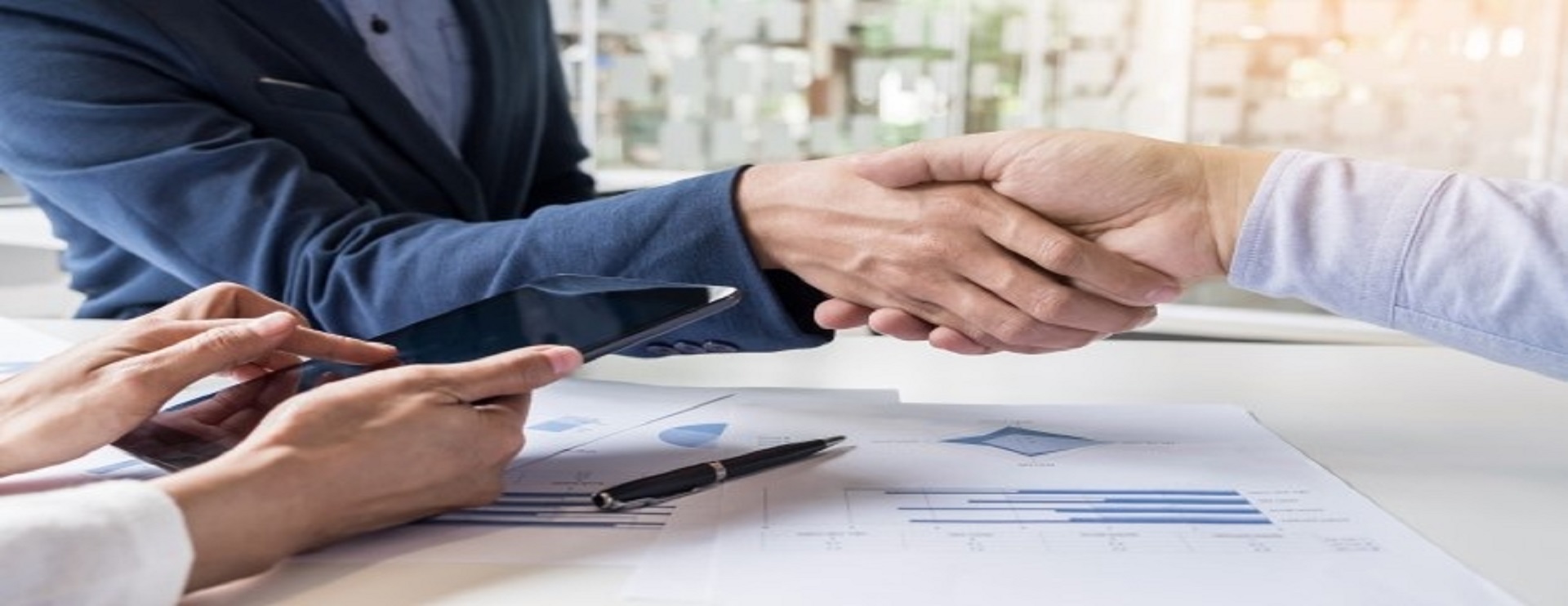 business-handshake-two-men-demonstrating-their-agreement-sign-agreement-contract-their-firms-companies-enterprises_1423-100